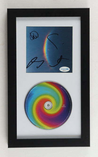 Coldplay Moon Music framed CD display with the insert signed by all four band members above the rainbow spiral CD, ACOA certified