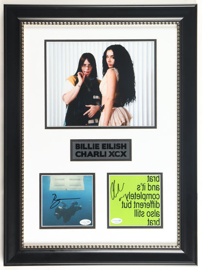 Billie Eilish and Charli XCX dual signed Guess framed display with a photo of the two artists, a name plate and two signed CD inserts, ACOA certified