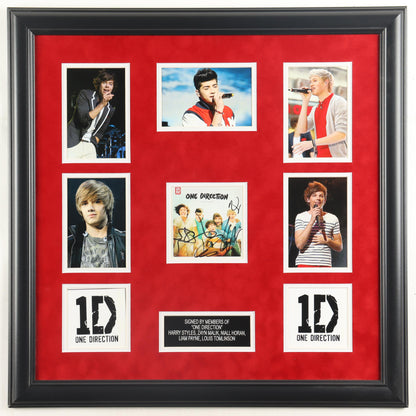 One Direction signed framed CD display with red matting, five member photos, 1D logos and signed pieces from all five members, JSA certified