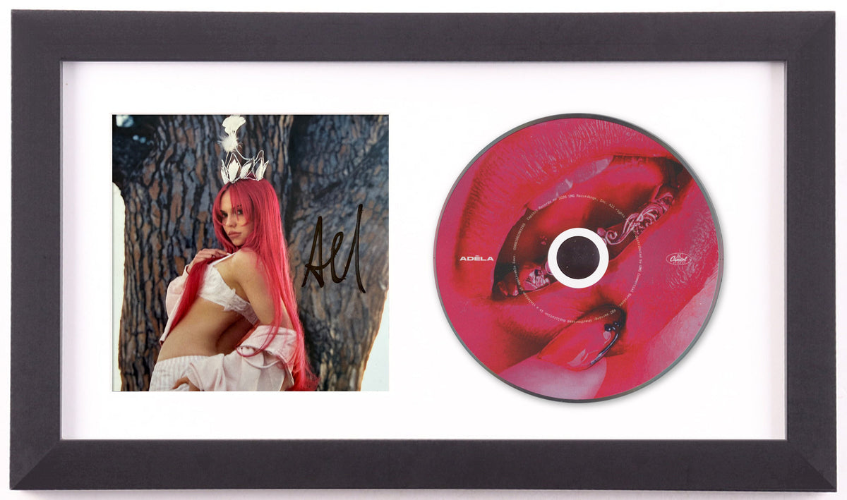 ADÉLA signed PRIMA art card and album disc in a black frame with a white mat