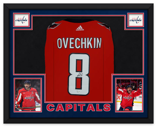 Alex Ovechkin signed red Washington Capitals number 8 jersey laid flat in a black frame with navy and red matting, Capitals logos, two photos of Ovechkin and CAPITALS lettering