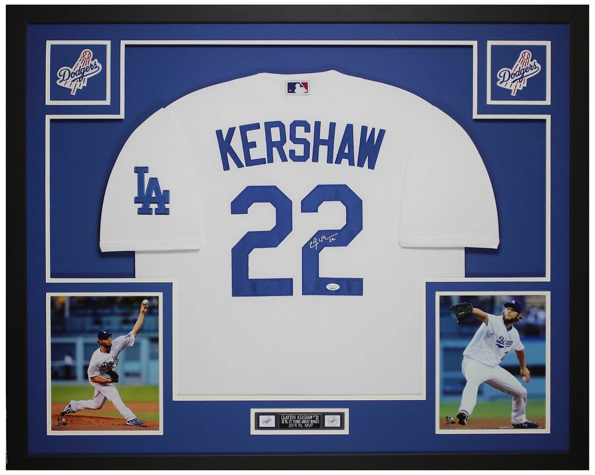 Clayton Kershaw signed Los Angeles Dodgers #22 white home jersey in a custom frame with royal blue mat, two Dodgers logo patches, two pitching photos and an engraved nameplate