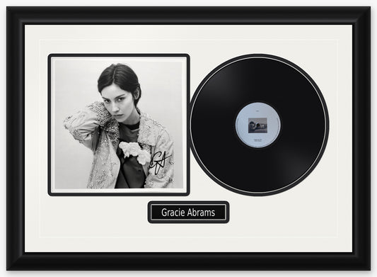 Gracie Abrams signed Daughter from Hell art card, a black and white portrait in an embellished jacket, signed in black, framed beside the black LP in a black frame with white matting, black reveals and a black Gracie Abrams nameplate
