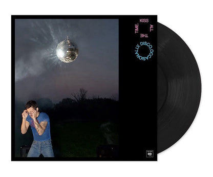 Harry Styles Kiss All The Time. Disco, Occasionally. album jacket with a disco ball over a twilight field, shown with the black vinyl record