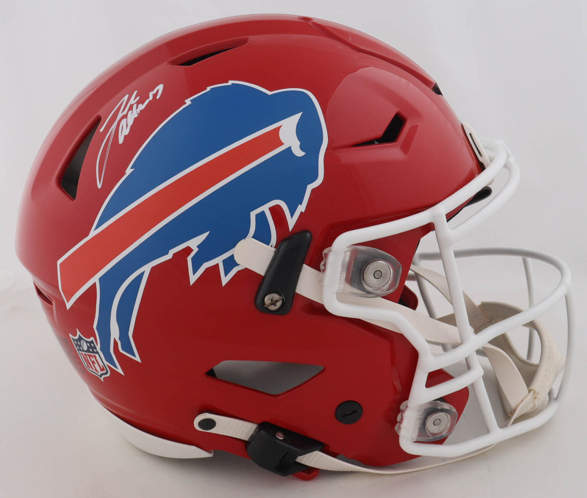 Josh Allen signature in white paint pen on the left side of a red Buffalo Bills throwback Riddell SpeedFlex full size helmet