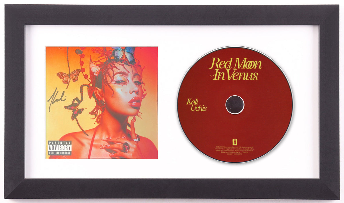 Kali Uchis signed Red Moon in Venus CD cover and album disc in a black frame with a white mat