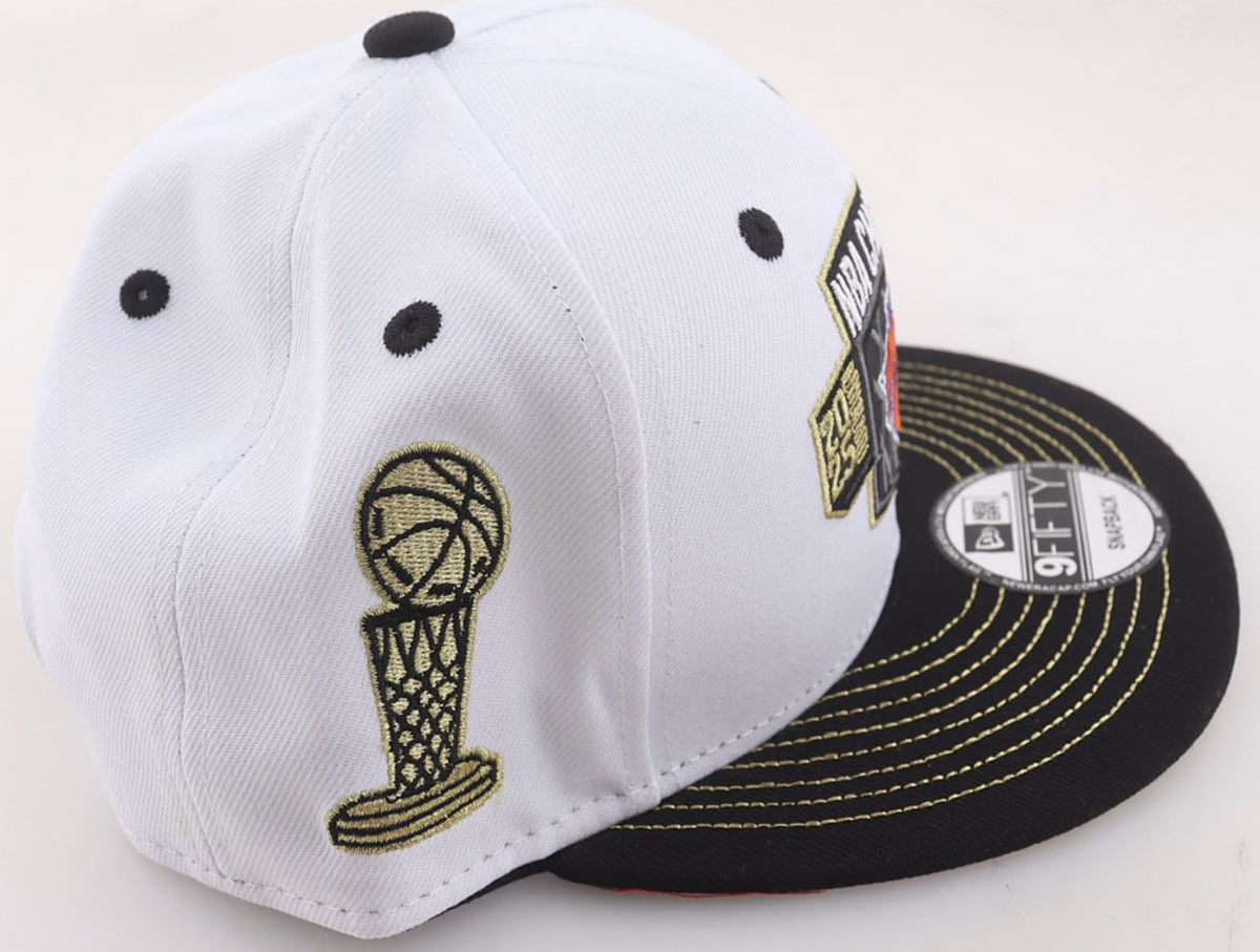 Side of the New York Knicks 2025-26 NBA Champions New Era 9FIFTY snapback showing the gold embroidered championship trophy patch