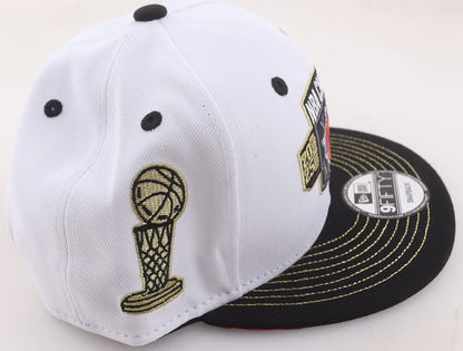 Side of the New York Knicks 2025-26 NBA Champions New Era 9FIFTY snapback showing the gold embroidered championship trophy patch