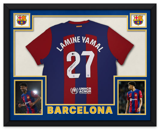 Lamine Yamal signed blue and garnet FC Barcelona number 27 home shirt, signed in black ink with the Beckett Witnessed hologram, shown in a black custom frame with blue and gold matting, FC Barcelona crests in the upper corners, two photographs and BARCELONA lettering