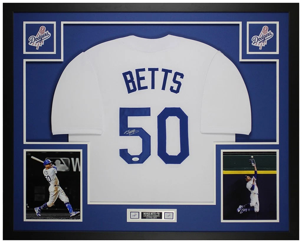 Mookie Betts signed Los Angeles Dodgers #50 white home jersey in a custom frame with royal blue mat, two Dodgers logo patches, batting and wall catch photos and an engraved nameplate