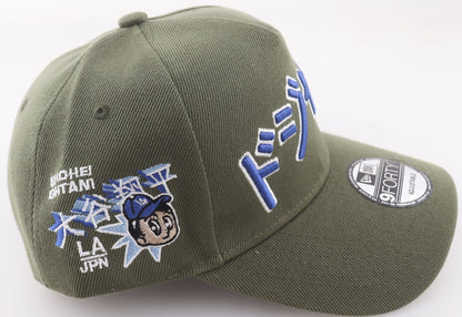Side of the olive green Shohei Ohtani Dodgers New Era 9FORTY hat showing the Shohei Ohtani patch with his name in kanji and a cartoon character in an LA cap