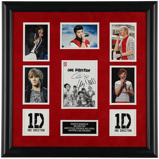 One Direction signed Up All Night Limited Yearbook Edition cover framed on a red suede mat with five member photos, two 1D logo cards and an engraved nameplate, GRAD authenticated