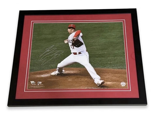 Shohei Ohtani signed 16x20 photo pitching in the Angels home white uniform, signed in silver on the left side, custom framed in black with red matting, MLB and Fanatics authenticated